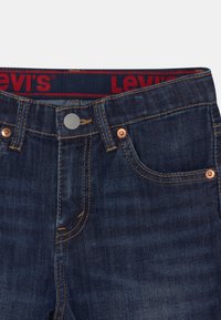 Levi's® PERFORMANCE - Jeansshorts - dark blue denim