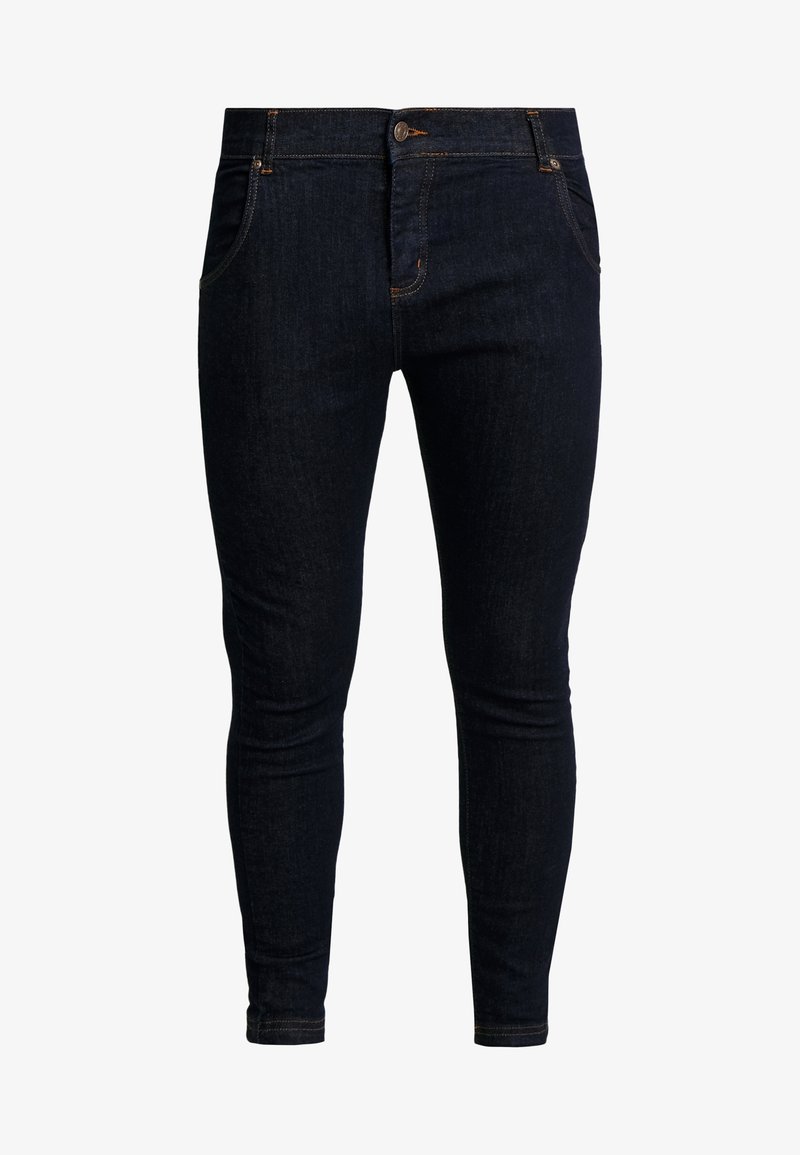Jeans ajustados de mezclilla azul oscura con un diseño clásico de cinco bolsillos, con costuras naranjas y cierre de botón. Textura suave y forma ajustada.