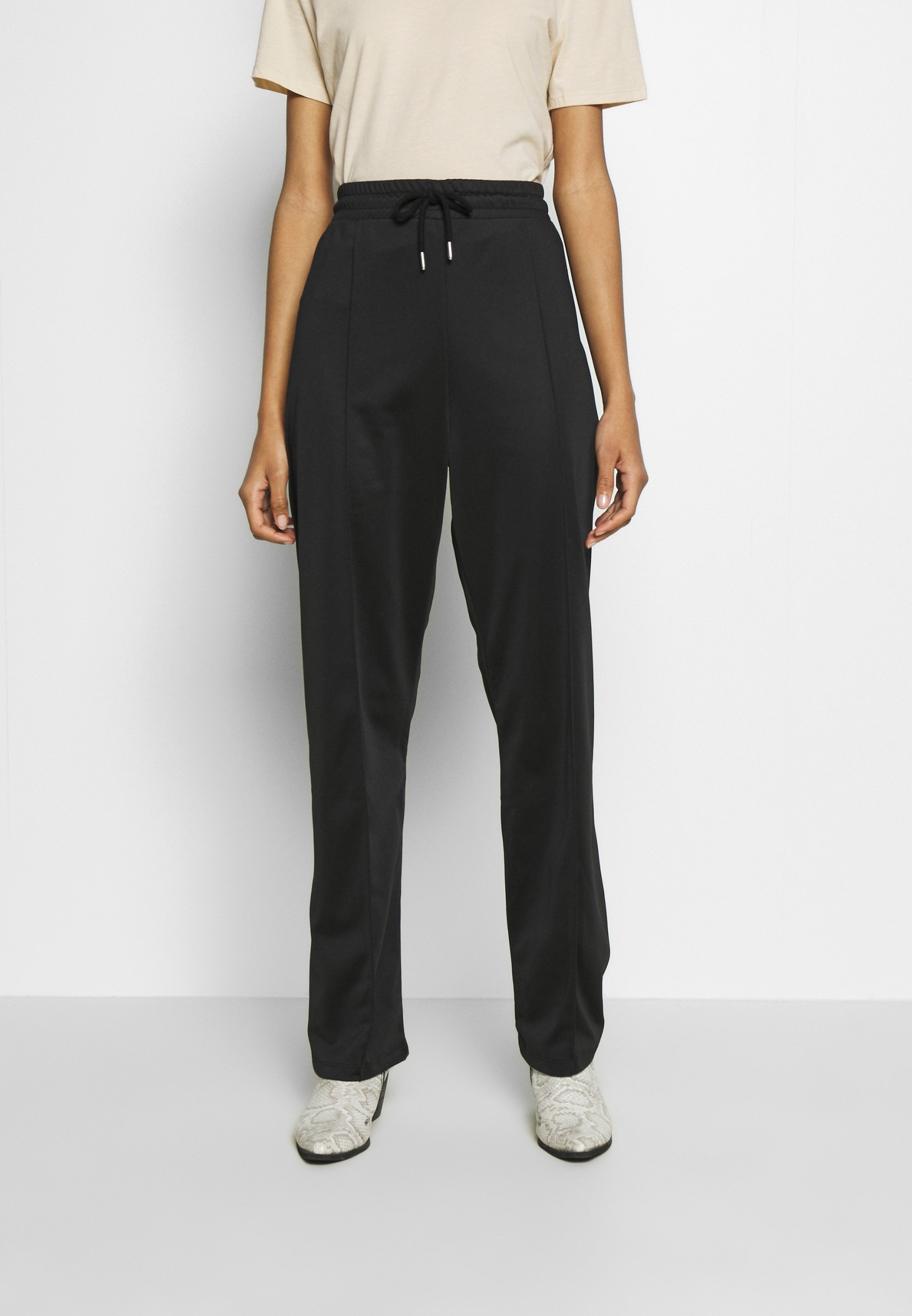 black trackie bottoms