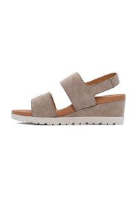 Beige Wildledersandalen mit Wedge-Absatz, zwei breiten Riemen, gepolstertem Fußbett und einer weißen Gummisohle mit Zickzackmuster.