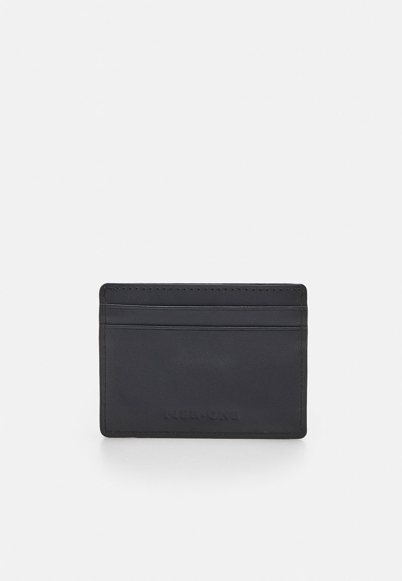 Black leather cardholder with four card slots, smooth texture, and embossed logo detail. Compact rectangular design.