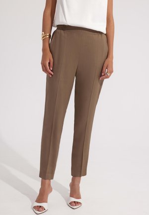 LNIANE - Spodnie materiałowe