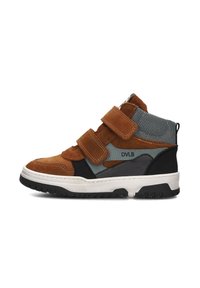 High-top sneaker with brown suede straps, blue and black panels, textured ankle collar, white sole, and black tread, side view.
