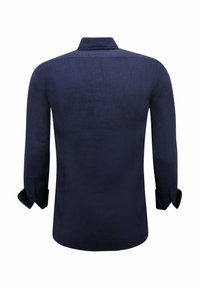 Marineblauwe lange mouwen shirt van linnen. Kenmerkt zich door een gespitse kraag, manchetten en een gladde textuurafwerking. Achteraanzicht alleen.