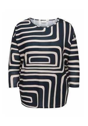 Langermet, svart og hvit skjorte med abstrakt geometrisk labyrintmønster og rund hals.