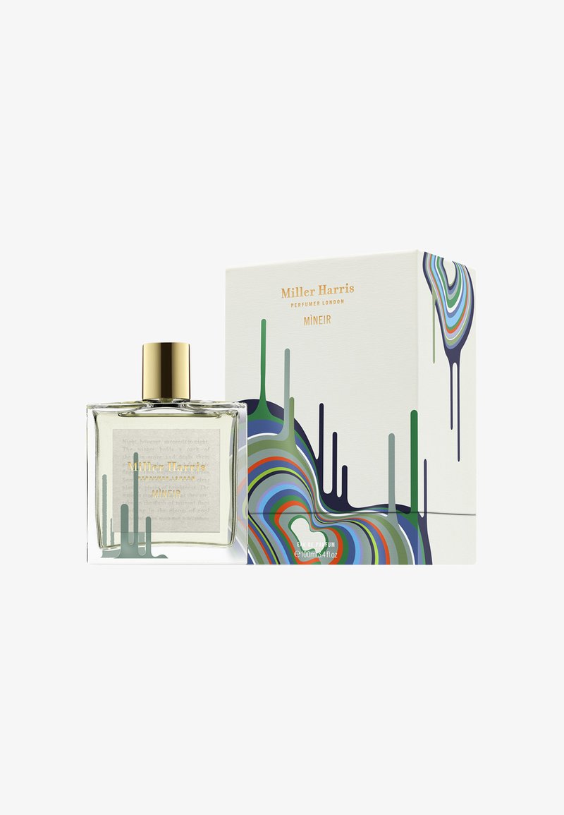 Klarer Glas-Parfümflakon mit einem goldenen Deckel. Die Box hat ein farbenfrohes, fließendes Design in Grün, Blau und Rot auf einem weißen Hintergrund. Goldene Schrift.