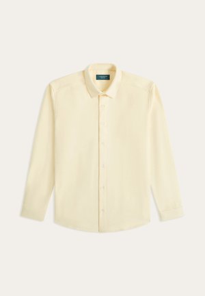 Overhemd met knoopsluiting van zachte stof in zachtgeel, met een klassieke kraag, lange mouwen en witte knopen aan de voorkant.