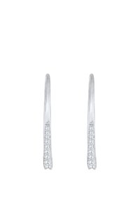 Boucles d'oreilles créoles en argent avec un design lisse et courbé, ornées d'une rangée de petites pierres translucides sur un côté pour plus de détail.