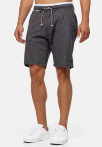 Mannen korte broek in donkergrijs, gemaakt van een lichtgewicht stof met een subtiele textuur, voorzien van een elastische tailleband en een gestreepte trekkoord.