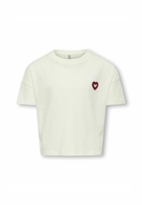 T-shirt cropped à manches courtes en coton crème clair avec un cœur bordeaux brodé sur la poitrine pour les détails. Design simple et texture douce.