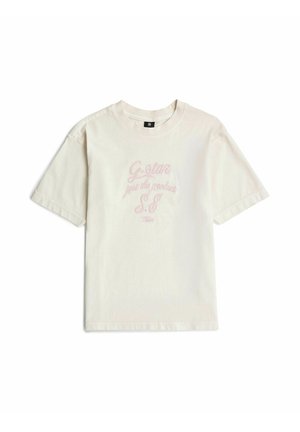 Krótki t-shirt w kolorze ecru z okrągłym dekoltem i różowym haftowanym napisem ""G-star just the product S.E"" z przodu.
