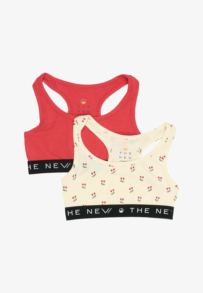 Dvije bralette: jedna je u punoj crvenoj boji, a druga bež s cvjetnim uzorkom. Obje imaju široke naramenice i crni pojas s logotipom "THE NEW".