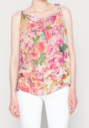 Top sin mangas de flores con una tela ligera y transparente. Presenta un patrón colorido de flores rosas y verdes. Detalle de cuello con volantes.