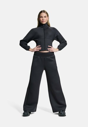 Under Armour, UNSTOPPABLE FLEECE TEXTURED - Панталони - ultimate black