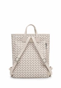 Sac à dos avec un motif géométrique en beige et crème. Doté de deux poignées et de bretelles ajustables. Comprend une poche latérale à fermeture éclair.