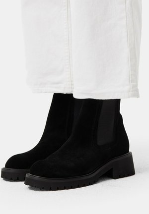 Platform ankle boots - black