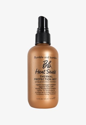 Bumble and bumble Heat Shield Brume de Protection Thermique, bouteille en bronze avec des points texturés, buse de pulvérisation noire, 125 ml, étiquetée avec les détails du produit.