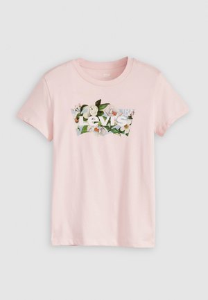 Lyserosa bomull T-skjorte med blomsterdesign og hvit tekst "Levi's" på brystet og rund hals. Korte ermer.