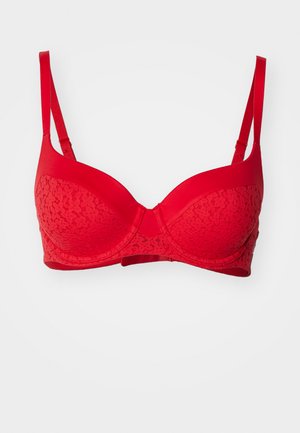 Red lace and smooth fabric bra featuring molded cups, adjustable straps, and a hook closure at the back. Textured lace design on cups.