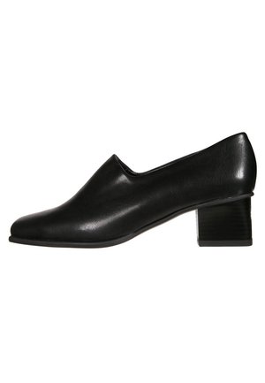 Chaussure pour femme en cuir noir à petit talon avec bout arrondi et talon carré, vue de profil sur fond blanc.