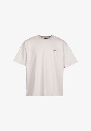 Off-White Kurzarm-T-Shirt mit Rundhalsausschnitt und kleinem quadratischem Logo-Patch mit gekreuzten Werkzeugen auf der linken Brust.