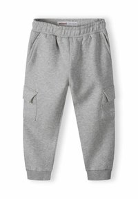 Grå sweatpants gjorda av mjukt tyg, med elastisk midjeband, två sidofickor och med mudd vid anklarna samt en cargoficka på sidan.