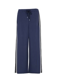 Pantalons large en marine en matériau doux, avec une taille à cordon de serrage et des bandes latérales blanches. Comprend deux poches latérales.