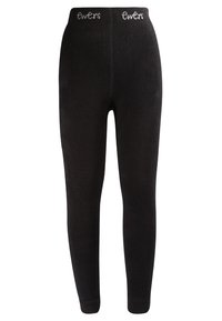 Schwarze gerippte Leggings aus weichem Material, mit einem elastischen Bund, der oben den Markennamen "Ewers" in weißer Naht trägt.
