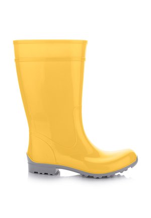 Żółty gumowy kalosz z szarą podeszwą, widok z boku, zaprojektowany na mokre warunki i do użytku na zewnątrz.
