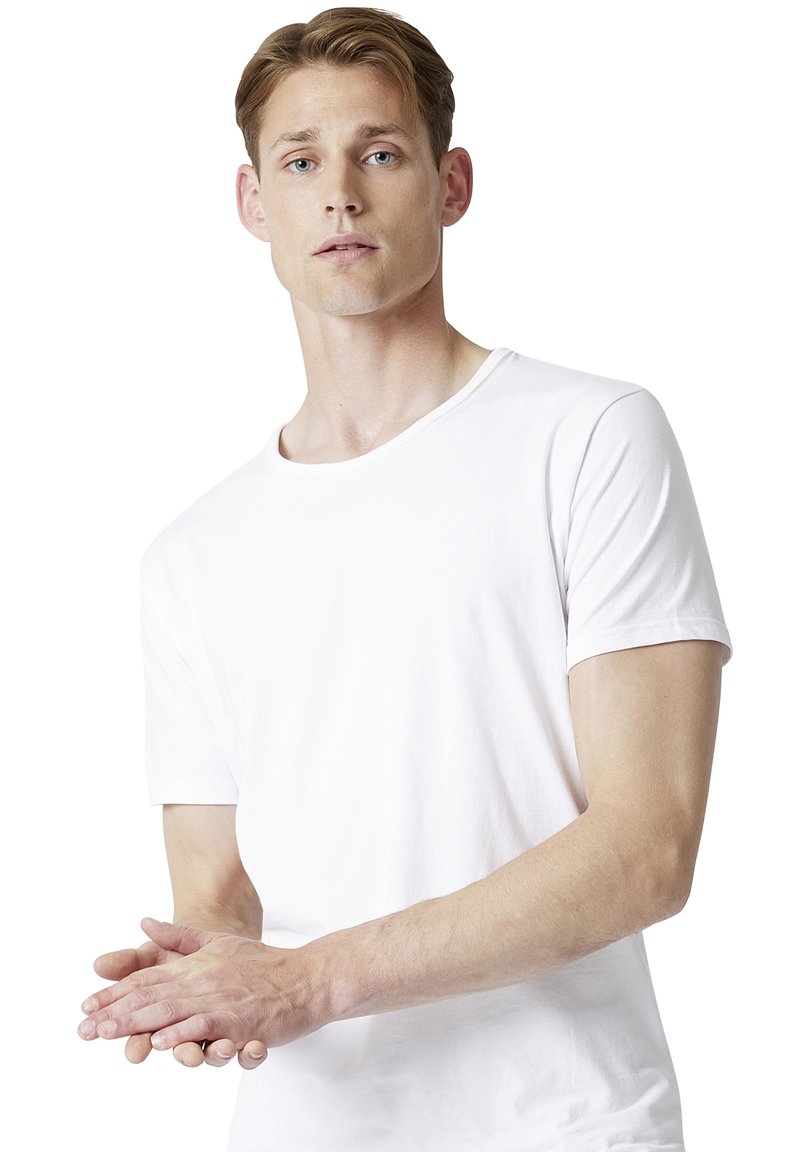 White cotton t-shirt with a round neck and short sleeves. The fabric appears soft and lightweight, with a fitted silhouette.