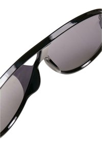 Urban Classics NAXOS - Gafas de sol - black gold