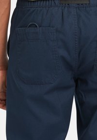 Timberland Teplákové kalhoty - dark sapphire