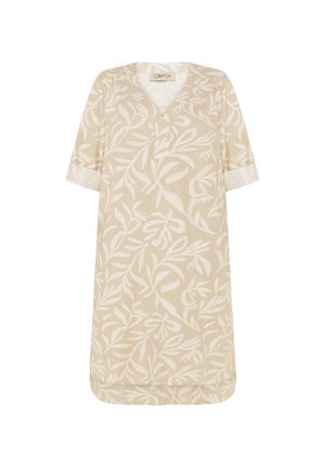 Tunique beige à manches courtes avec motif botanique feuillu blanc, col en V et ourlet légèrement incurvé, tissu léger.