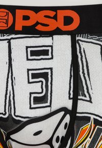 White boxer briefs with a textured fabric, featuring a black waistband with "PSD" in bold orange, and graphic print details in black and yellow.