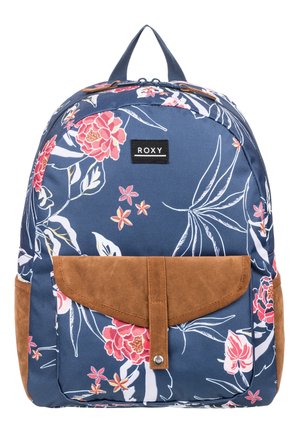 Sac à dos Blue Roxy avec imprimé floral rose, poche avant en daim marron et accents latéraux, poignée supérieure et fermeture à double glissière.