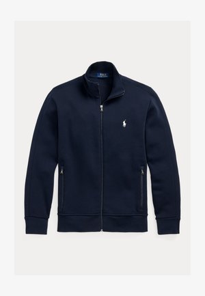 Tengerészkék cipzáras dzseki álló gallérral, cipzáras oldalzsebekkel és kis fehér Polo Ralph Lauren ló logóval a bal mellrészen.