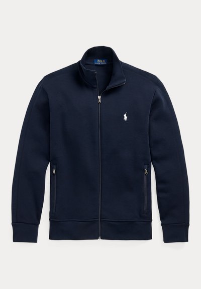 Navy zip-up jacket with stand collar, zippered side pockets, and small white Polo Ralph Lauren horse logo on the left chest.