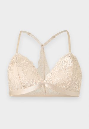 Beige lace bralette with adjustable thin shoulder straps and a racerback design on a plain light background.