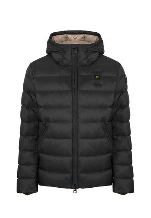 Giacca a vento nera con cappuccio aderente, cuciture orizzontali, due tasche laterali e zip frontale. Foderata in tessuto beige.