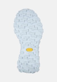 Blue rubber outsole with deep traction patterns, featuring a Vibram logo. Textured surface for grip and durability. Size 38.
