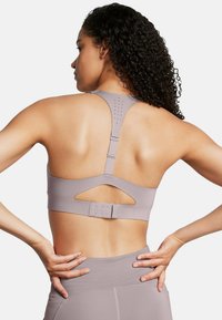 Under Armour UPLIFT MID - Medium support sports bra - tetra gray