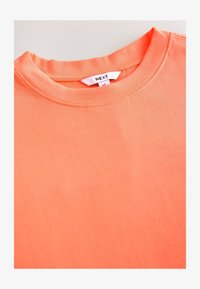 Selezionato, fluro orange