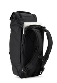 Black backpack made of durable fabric, featuring ergonomic straps, a padded laptop compartment, and zippered pockets for additional storage.