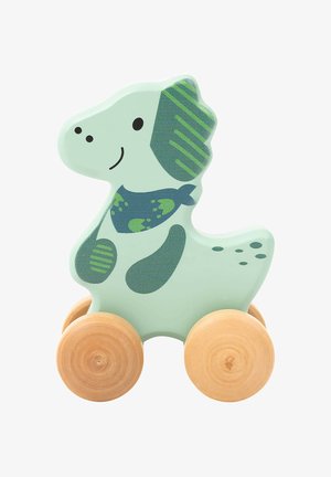 Wooden dinosaur toy in mint green with a smiling face and patterned details. Features round wooden wheels for movement.