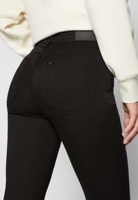 Lee Jean flare - black denim
