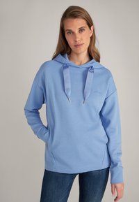 Felpa con cappuccio blu chiaro dal taglio comodo, con coulisse e tasche laterali. Realizzata in tessuto morbido, presenta un dettaglio con logo sulla manica.