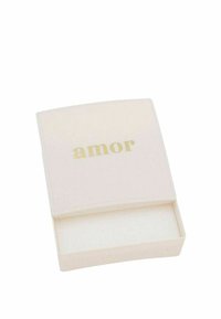Caja cuadrada de color rosa claro con una textura suave; presenta la palabra "amor" en letras doradas en la parte superior y un interior blanco vacío.