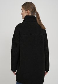 Oxmo OXTOVA - Halflange jas - black