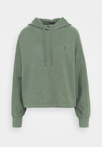 Sweatshirt verde cropped realizzato in tessuto testurizzato, caratterizzato da un cappuccio, coulisse e polsini a costine con un logo discreto sul davanti.