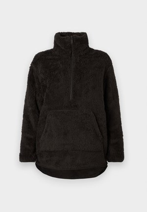 Black fleece pullover with a high collar, half-zip front, and a kangaroo pocket. Soft, textured fabric with a relaxed fit.